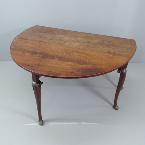 2032 - A Georgian mahogany oval drop-leaf dining table, on cabriole legs with spade feet. 139x73x47cm (exte... 