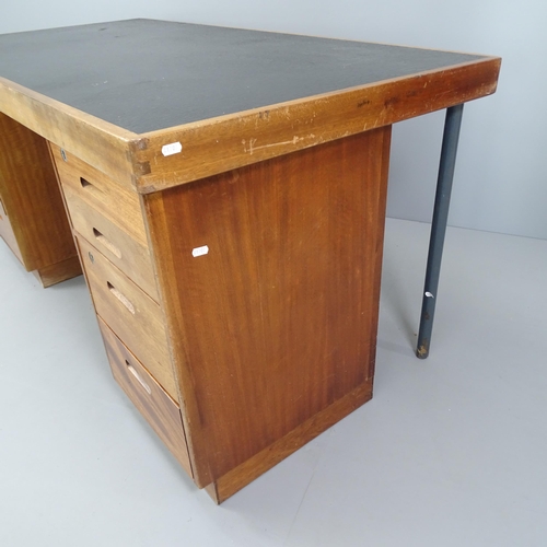 2033 - A mid-century teak twin pedestal desk, with inset black faux-leather skiver and eight drawers. Overa... 