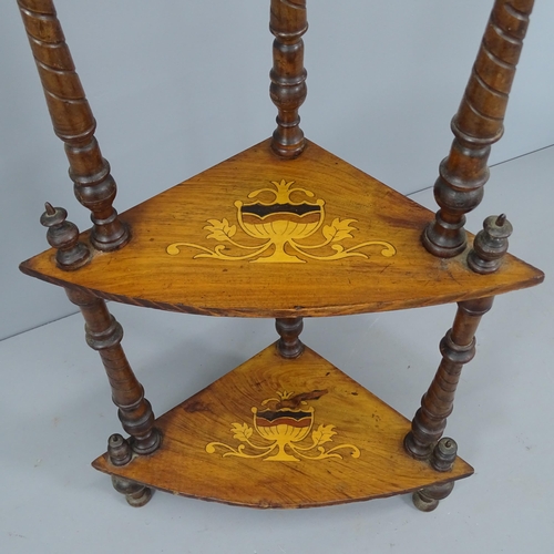 2036 - A Victorian mahogany four tier corner whatnot with inlaid decoration. Height 150cm.