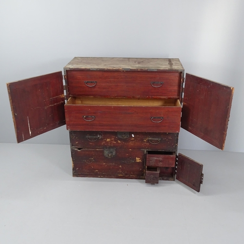 2038 - A late 20th century Japanese two section Tansu chest, the top section with two long drawers behind c... 