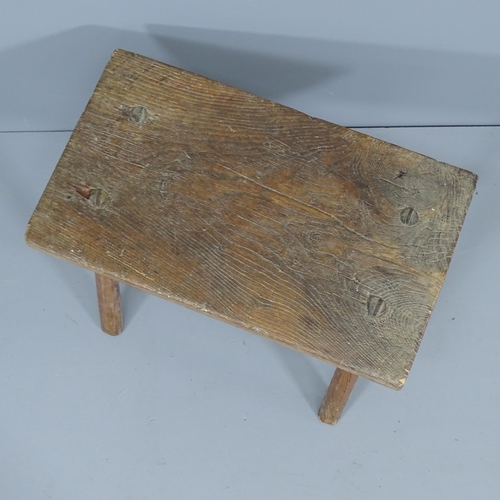 2048 - A rustic elm stool. 55x39x32cm