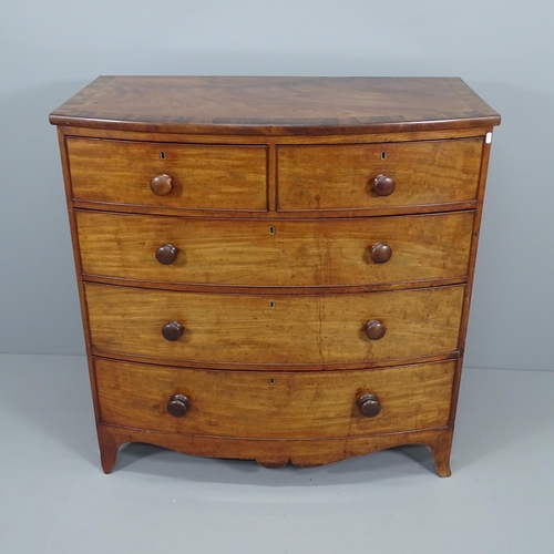 2059 - A Georgian crossbanded mahogany bow-front chest of two short and three long drawers. 106x107x56cm.