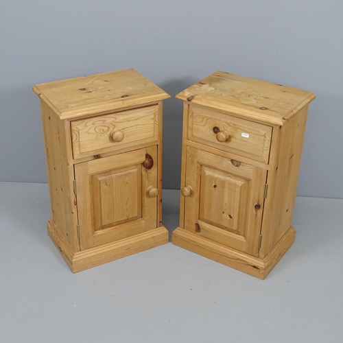 2065 - A pair of modern pine bedside cabinets. 39x62x27cm