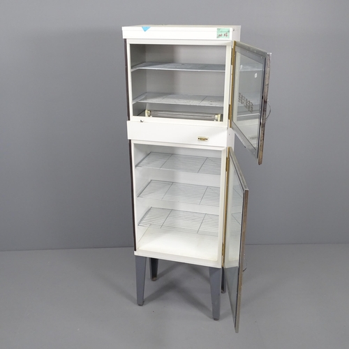 2066 - A vintage Japanese two door medical specimen cabinet. 46x143x29cm