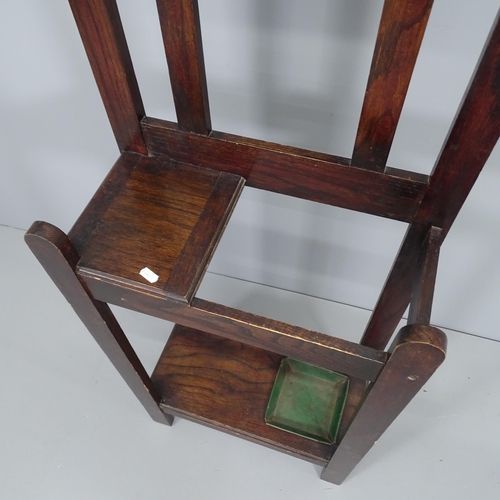 2067 - An early 20th century oak Hall stand of narrow form, with mirrored back and original drip tray. 49x1... 