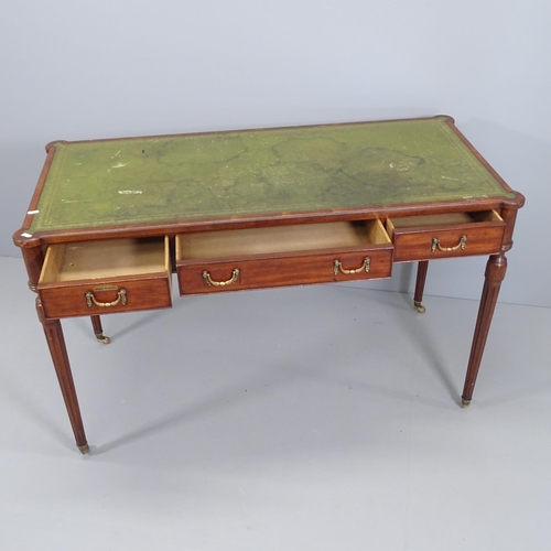 2069 - A Victorian style writing table, with inset tooled and embossed green leather skiver, three frieze d... 