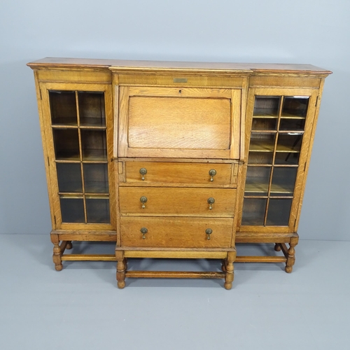 2078 - A 1930's oak side by side bureau bookcase, with presentation plaque, 143x118x44cm. With 2 keys