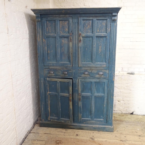 2087 - A large painted pine housemaids cupboard, fitted with four panelled doors and two drawers. 137x205x5... 