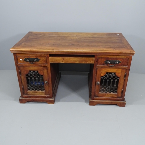 2089 - A sheesham twin pedestal writing desk, with fitted drawers and cupboards. 142x79x77cm