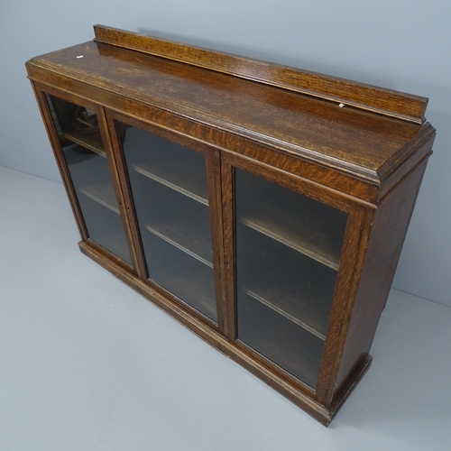 2090 - A1920's oak 3 glazed door bookcase with adjustable shelves.
(left hand door locked with no key) 156x... 