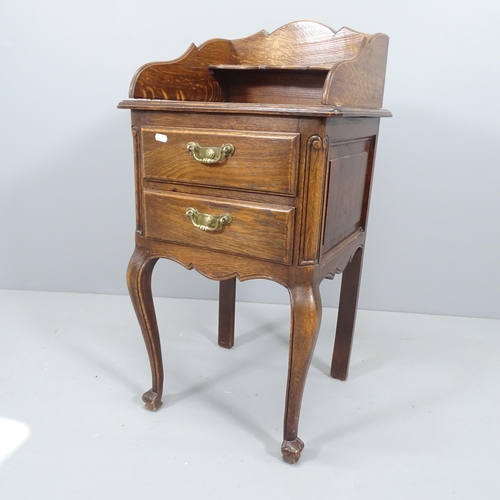 2121 - A French oak bedside chest of 2 drawers, with 2-tier raised gallery. 44zx88x40cm.