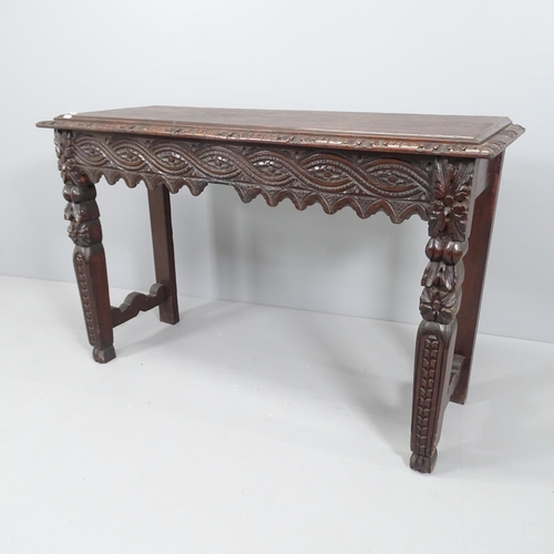 2126 - A Victorian carved oak hall table.121x80x44cm.