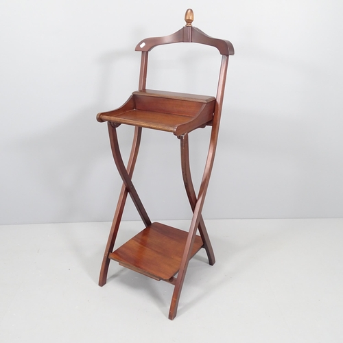 2127 - A modern mahogany folding valet stand. 50x124x50cm.