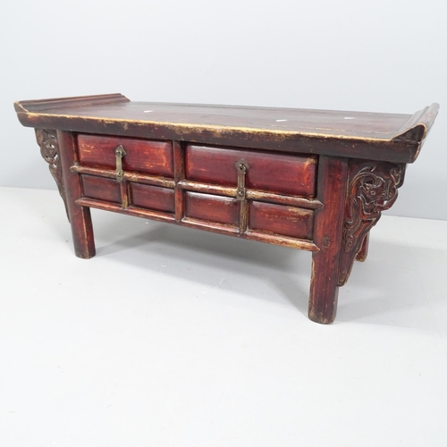 2128 - An antique Chinese elm low alter table with 2 drawers. 98x42x40cm.