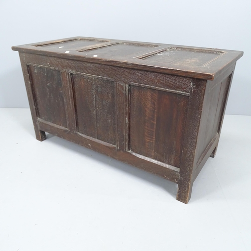 2129 - A small panelled oak blanket box. 92x50x44cm.