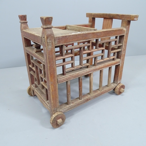 2134 - A Chinese elm child's trolley. 58x52x40cm. A/F.