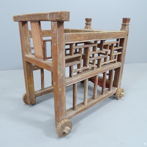 2134 - A Chinese elm child's trolley. 58x52x40cm. A/F.