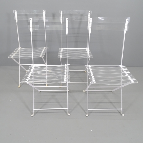 2137 - A set of 4 Lucite and white enamelled steel folding chairs.