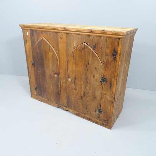 2143 - A 2 door gothic style reclaimed pine cupboard. 102x81x36cm.