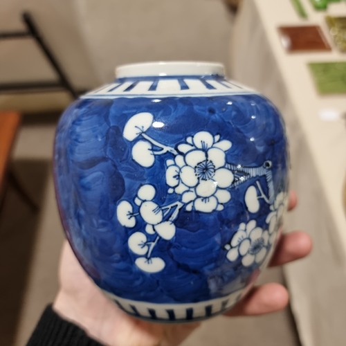 121 - A pair of blue and white prunus jars, with 4 character marks to base, and an Imari vase, tallest 18.... 