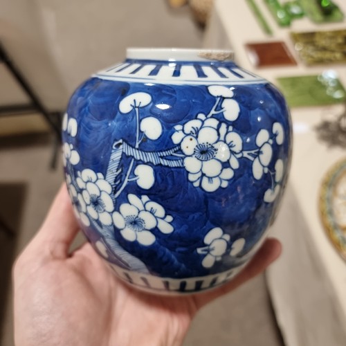 121 - A pair of blue and white prunus jars, with 4 character marks to base, and an Imari vase, tallest 18.... 