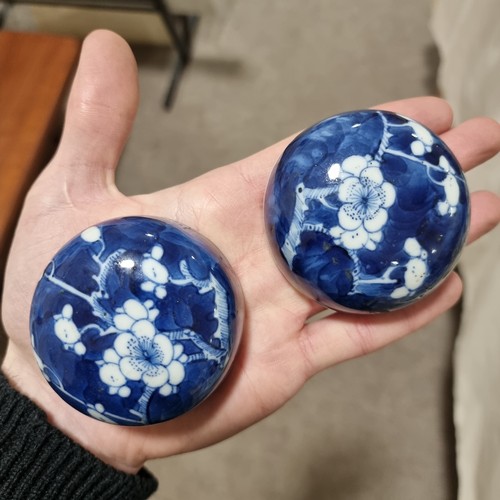 121 - A pair of blue and white prunus jars, with 4 character marks to base, and an Imari vase, tallest 18.... 