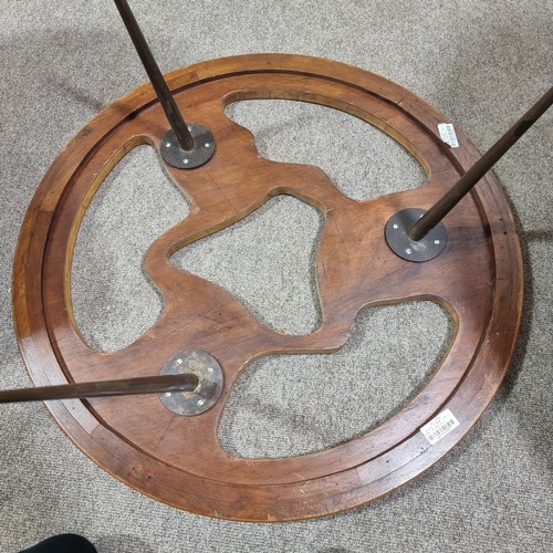 523 - A mid-century Brazilian fruitwood coffee table, with organic abstract fruitwood inserts, on solid br... 