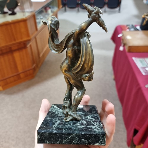 51 - An early 20th century patinated bronze Classical Zeus sculpture, unsigned, on green veined marble ba... 