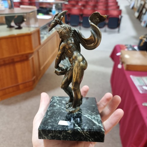 51 - An early 20th century patinated bronze Classical Zeus sculpture, unsigned, on green veined marble ba... 