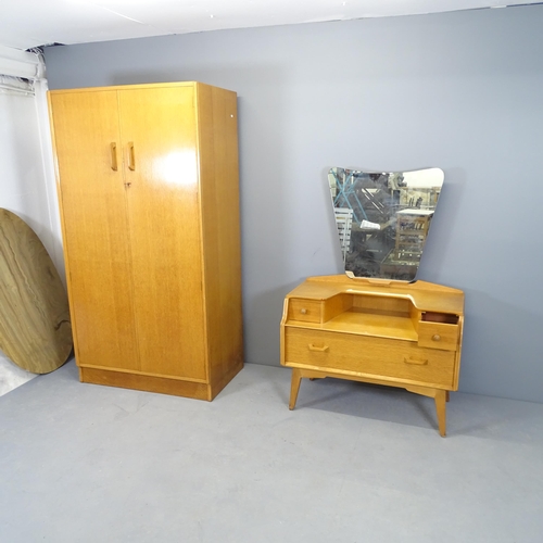 2500 - A mid-century teak G-Plan bedroom suite consisting of a dressing table with raised mirror back, 92x1... 