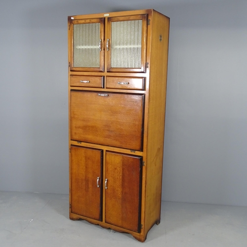 2504 - A mid century pine maidsaver cabinet, with label for 