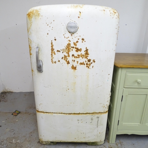 2507 - A mid-century General Electric Company (G.E.C) white enamelled fridge, with interior fittings and ma... 