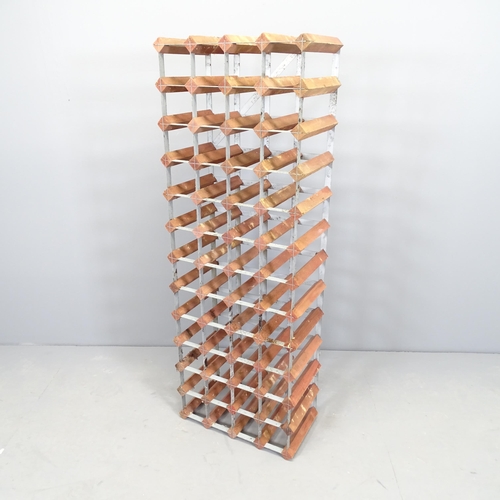 2512 - A 48 bottle wine rack. 43x120cm.