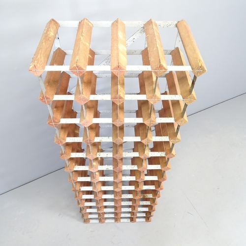 2512 - A 48 bottle wine rack. 43x120cm.