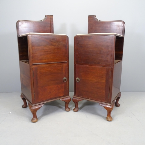 2515 - A pair of modern mahogany tile-top bedside pot cupboards. Overall 40x99x37cm