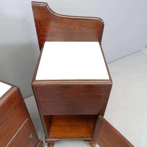 2515 - A pair of modern mahogany tile-top bedside pot cupboards. Overall 40x99x37cm