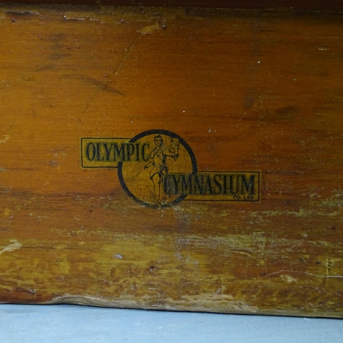 2521 - A vintage oak pommel horse, with label for Olympic Gymnasium. 48x49x25cm