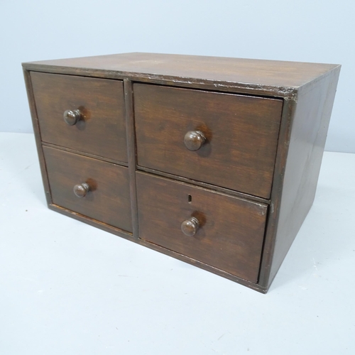 2156 - A 4 drawer oak desktop filing chest. 51x31x36cm.