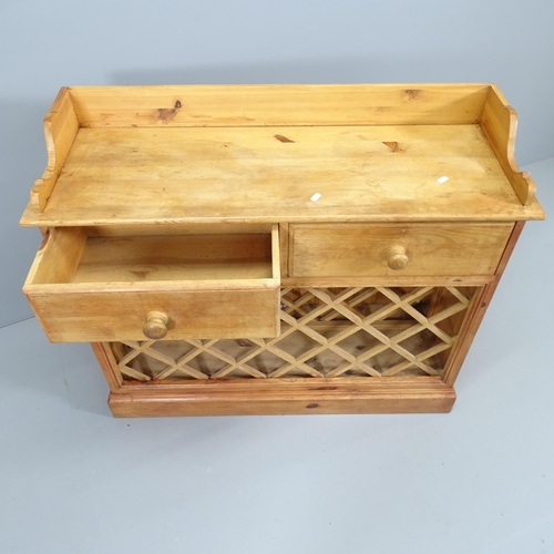 2158 - A pine side table with inbuilt wine rack and 2 drawers. 99x86x35cm.