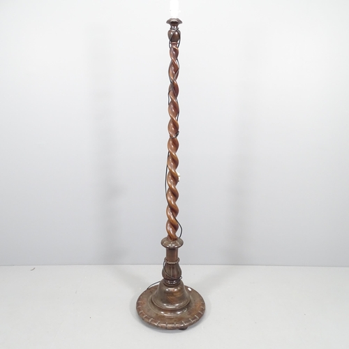 2160 - A vintage standard lamp with mahogany barley twist column.  156cm.