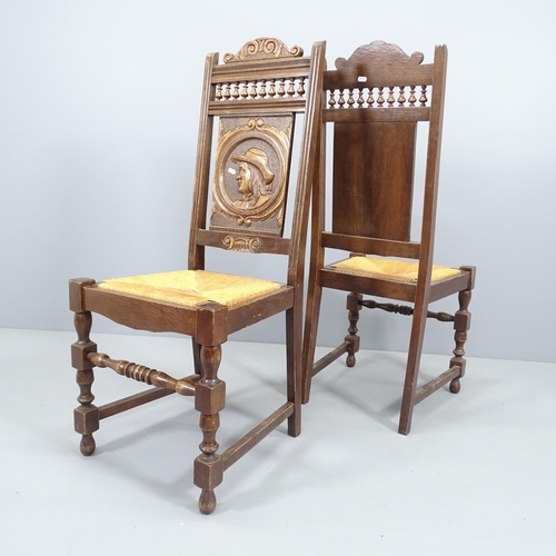 2161 - A set of 6 French oak Breton chairs, with carved back panels and rush seats.