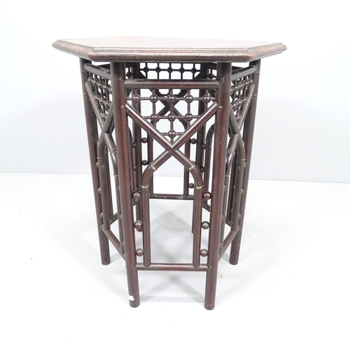 2163 - A late 19th century Anglo Moorish hexagonal side table in the manner of Liberty & Co. 46x54cm.