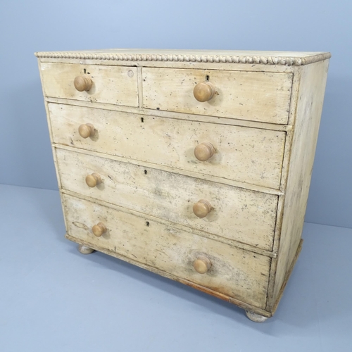 2169 - An antique pine chest of two short and three long drawers, with applied rope-twist decoration and ra... 