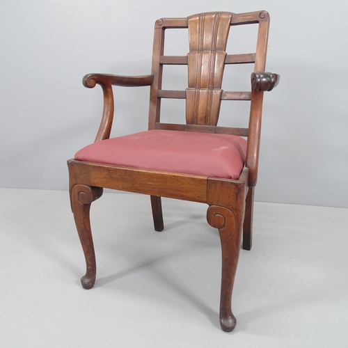 2183 - Wylie and Lochhead, a 1930s Art Deco armchair in walnut with shaped back and leather seat, with make... 