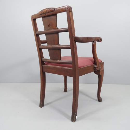 2183 - Wylie and Lochhead, a 1930s Art Deco armchair in walnut with shaped back and leather seat, with make... 