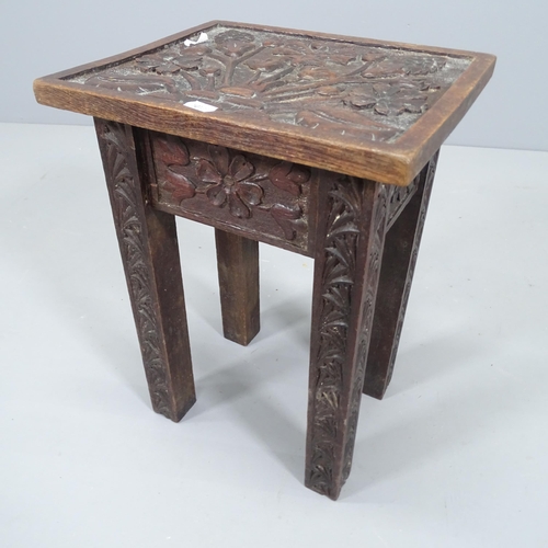 2189 - A Victorian Arts & Crafts occasional table, with floral carved decoration. 31x42x26cm.