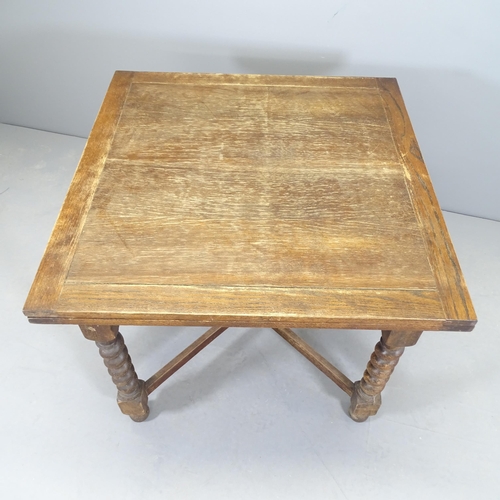 2531 - A 1920s oak draw-leaf table. 90 (extending to 148cm)x76x88cm