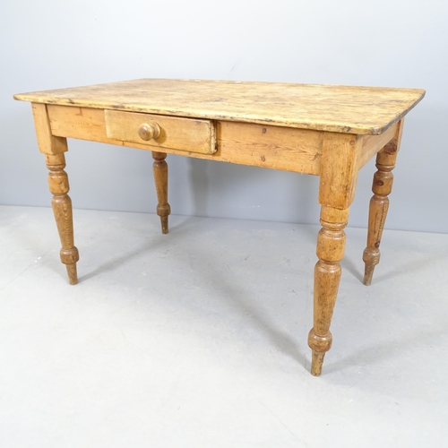 2549 - A pitch pine plank top farmhouse kitchen table, with single frieze drawer and raised on turned legs.... 