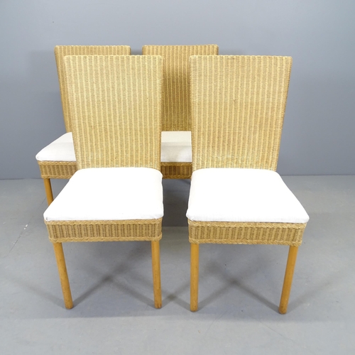 2555 - A set of four Lloyd Loom wicker dining chairs