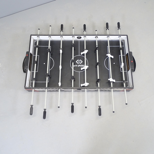 2558 - A Hy-Pro table football game. Overall 122x45cm.